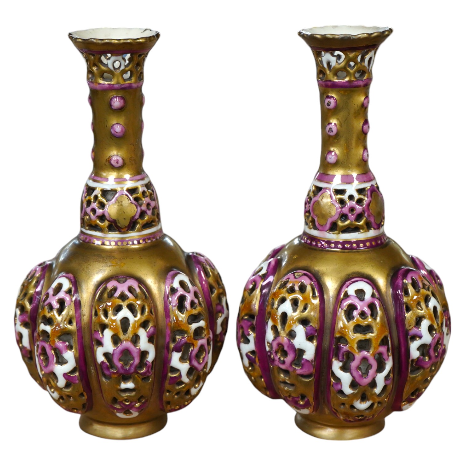 A pair of small Hungarian Zsolnay reticulated vases, 15cm high. Condition - good